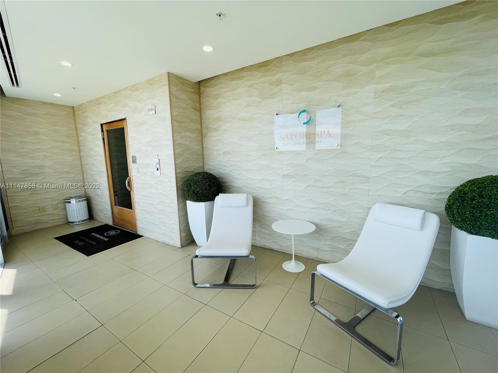 1100 Biscayne Boulevard, Unit 2003 Miami, FL 33132 - Photo 24 of 24 a bathroom with a sink toilet and mirror