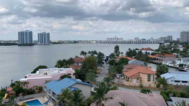 a view of a lake and yard