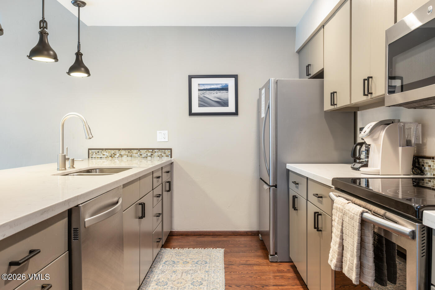 280 Gopher Road, Unit C9 Eagle-Vail, CO 81620 - Photo 13 of 27 a kitchen with stainless steel appliances granite countertop a sink stove and refrigerator