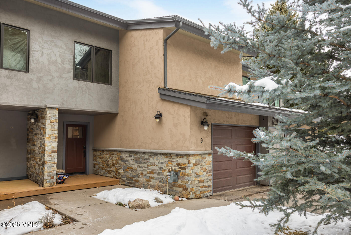 280 Gopher Road, Unit C9 Eagle-Vail, CO 81620 - Photo 27 of 27 a side view of a house with a yard