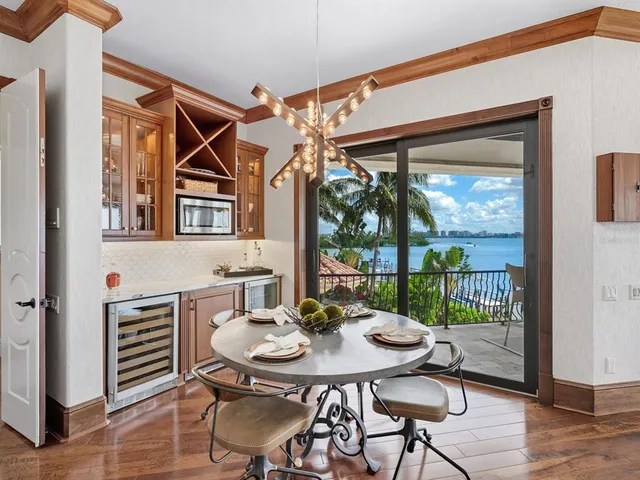 a view of yard with swimming pool and seating