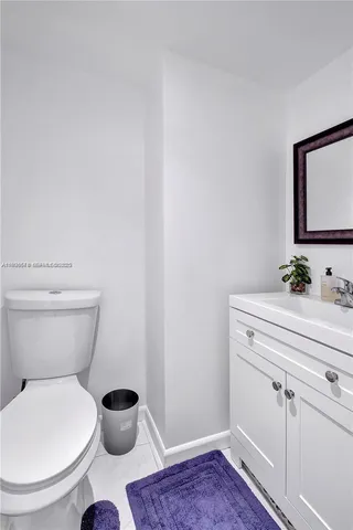 a bathroom with a toilet and a sink