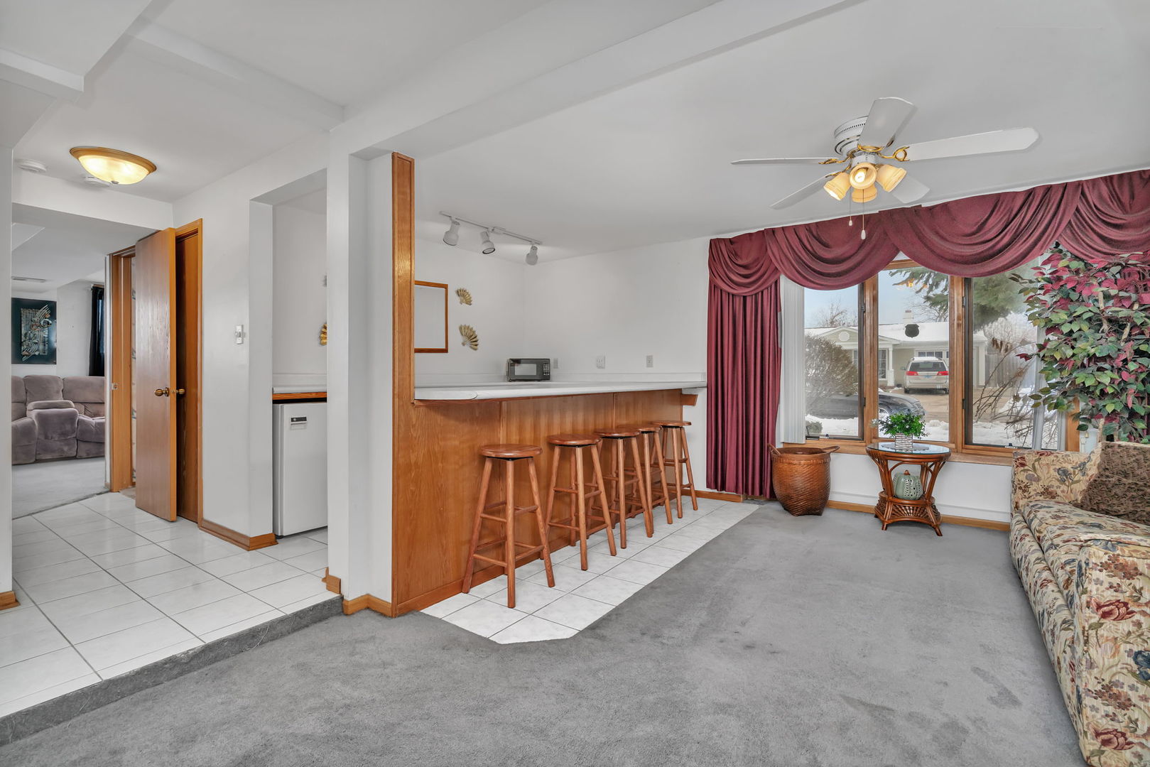 334 Hemlock Avenue Romeoville, IL 60446 - Photo 19 of 24 a very nice looking room with a large window and a chandelier