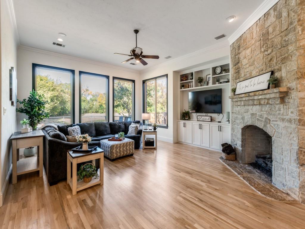 631 Deforest Court Coppell, TX 75019 - Photo 13 of 40 Great built-ins give more storage and updated light wood flooring keeps the space bright.