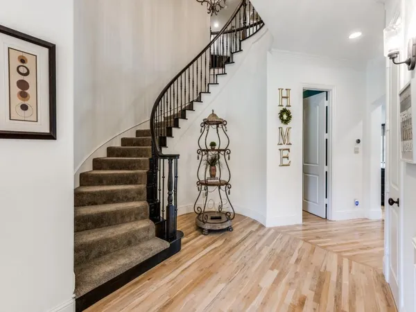 a view of entryway with wooden floor