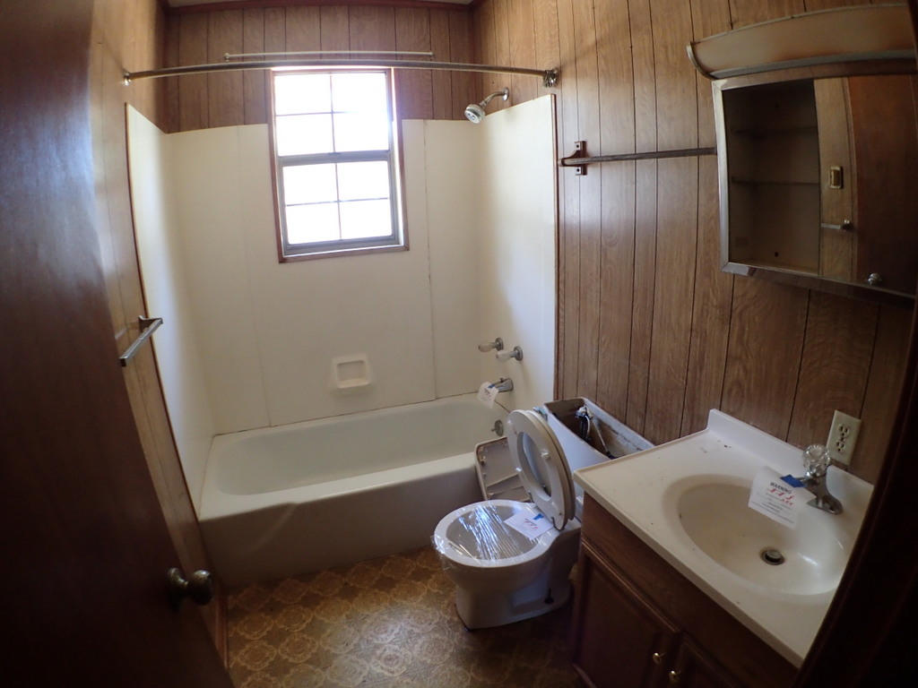 5326 Olin Merritt Street Baker, FL 32531 - Photo 6 of 9 a bathroom with a sink toilet and shower