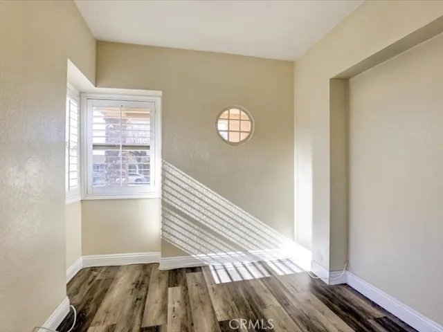 a view of entryway with wooden floor