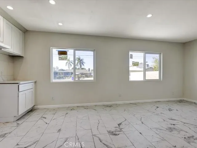 a view of a room with a large window