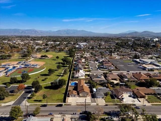 an aerial view of a house with a garden