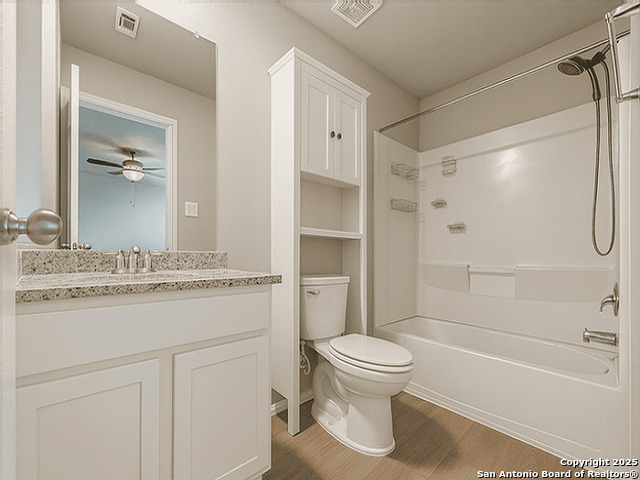 3831 Key W Way Converse, TX 78109 - Photo 7 of 18 a bathroom with a sink toilet and shower