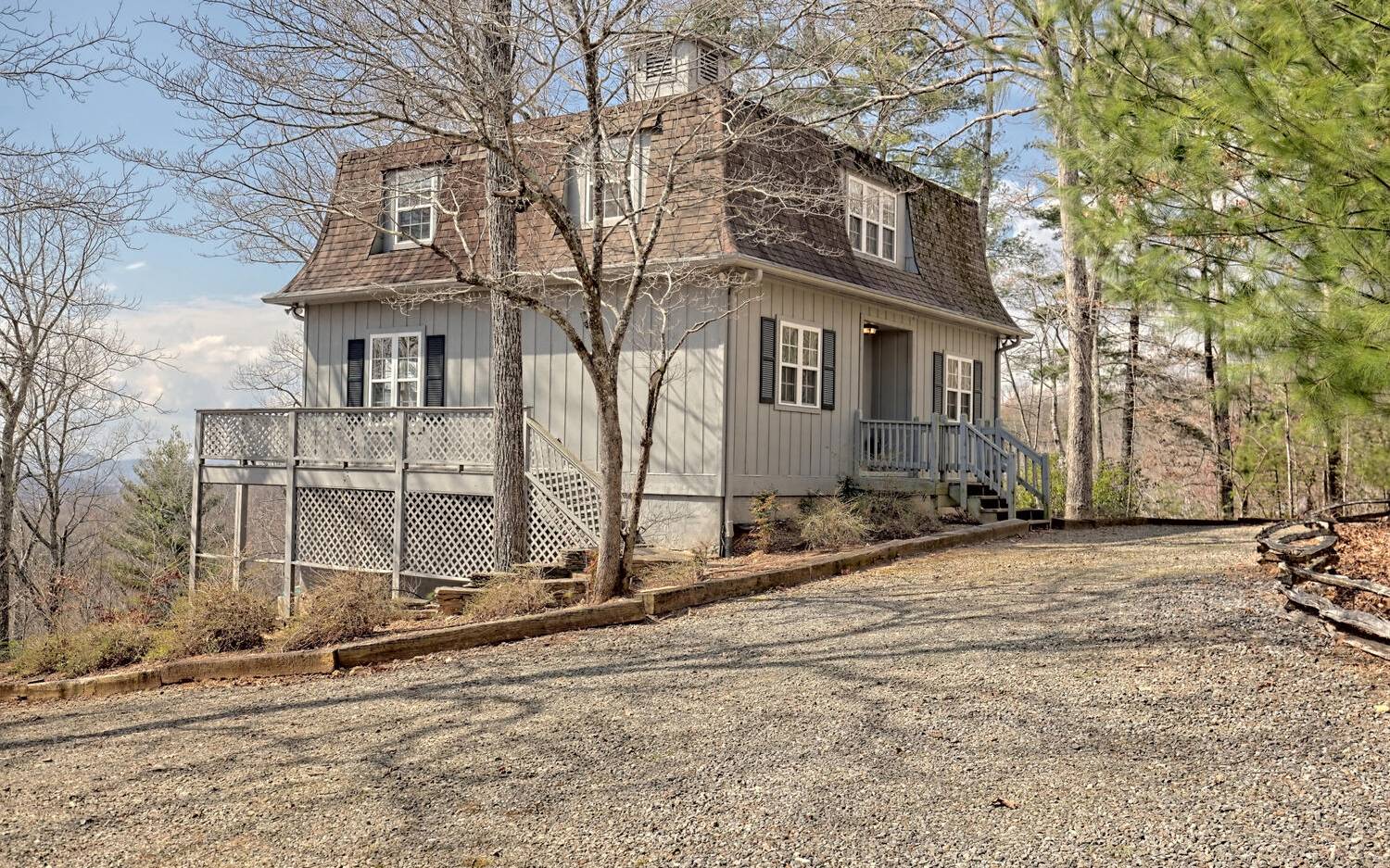 417 Hidden Forest Lane Hayesville, NC 28904 - Photo 1 of 4 a view of a house with snow on the road