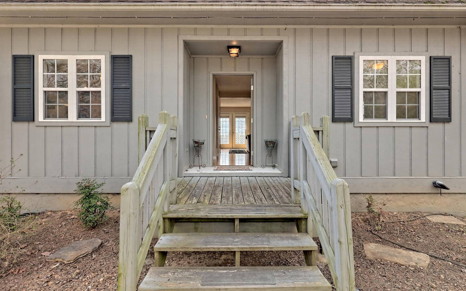 417 Hidden Forest Lane Hayesville, NC 28904 - Photo 4 of 4 a front view of a house with a garden