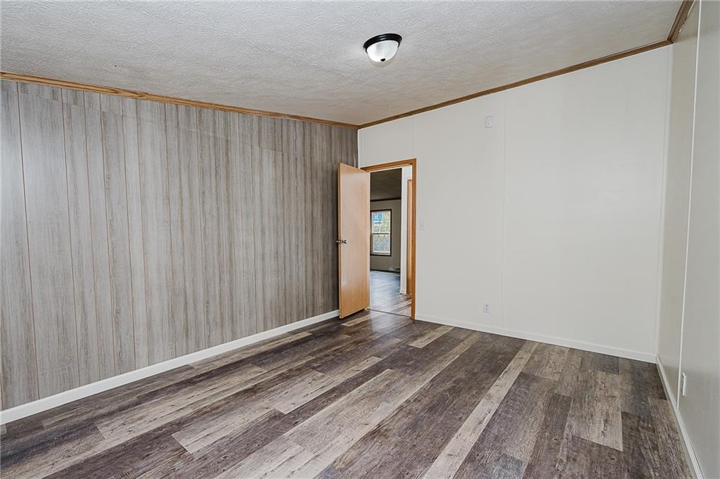 155 Baker Road Worthington, PA 16262 - Photo 21 of 50 a view of a room with wooden floor