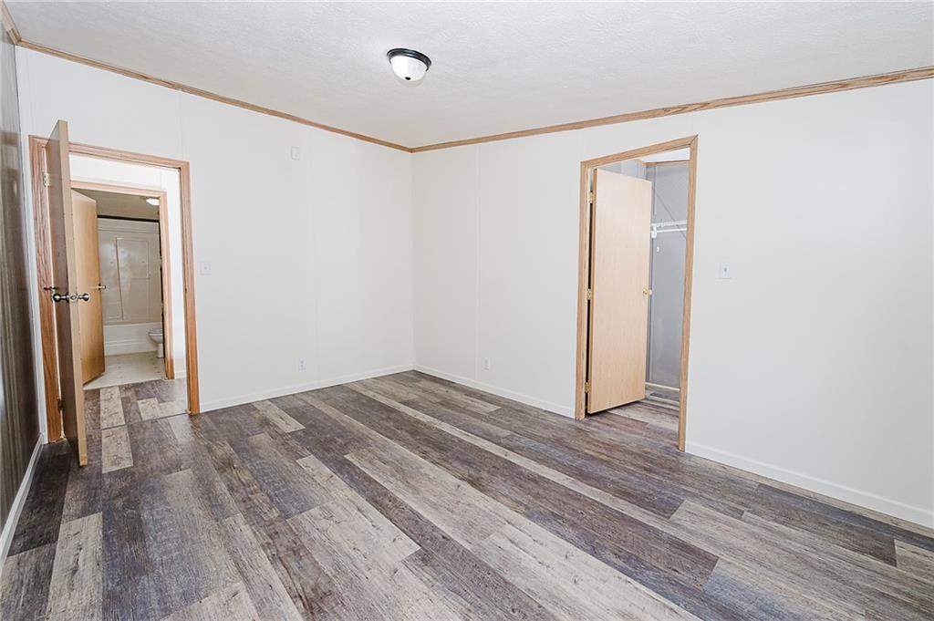 155 Baker Road Worthington, PA 16262 - Photo 22 of 50 a view of empty room with wooden floor