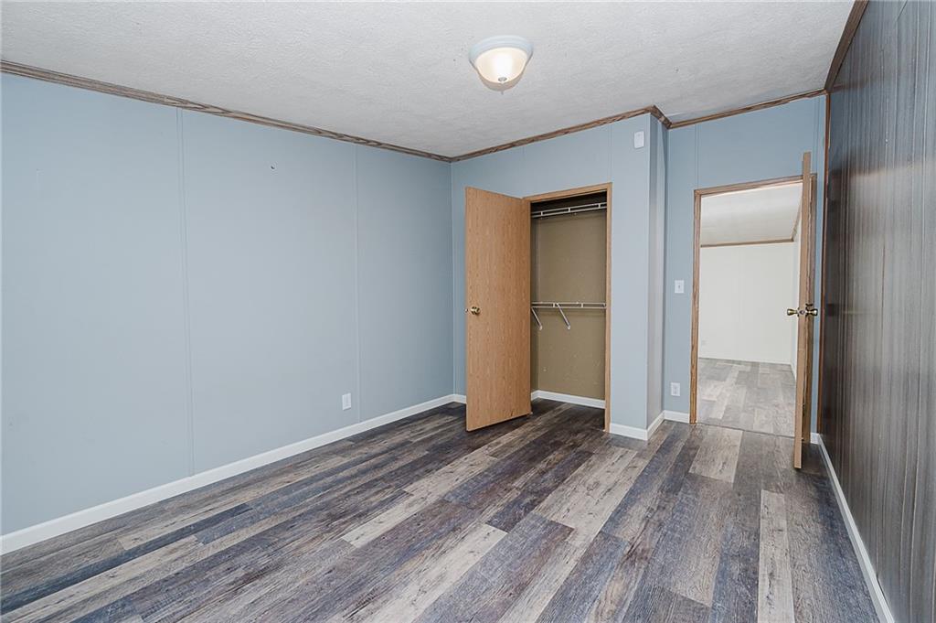 155 Baker Road Worthington, PA 16262 - Photo 24 of 50 a view of a hallway with wooden floor