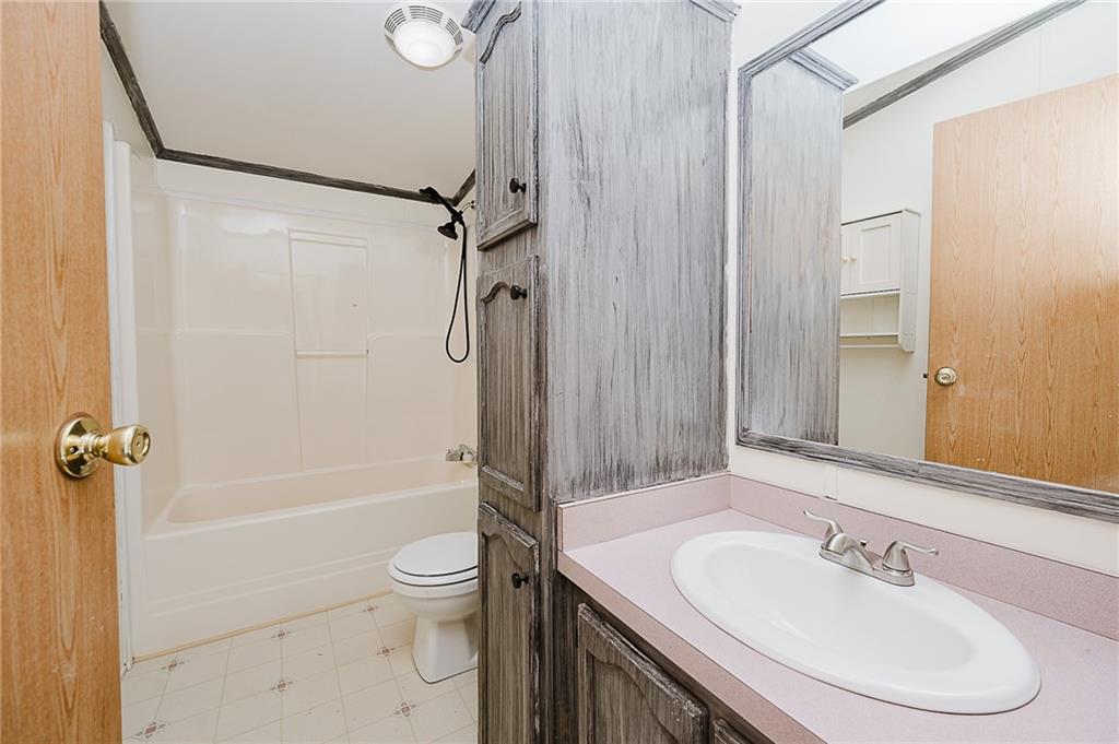 155 Baker Road Worthington, PA 16262 - Photo 26 of 50 a bathroom with a sink toilet and shower