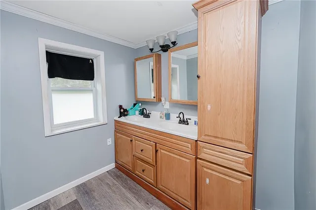 a bed room with a bed and dresser