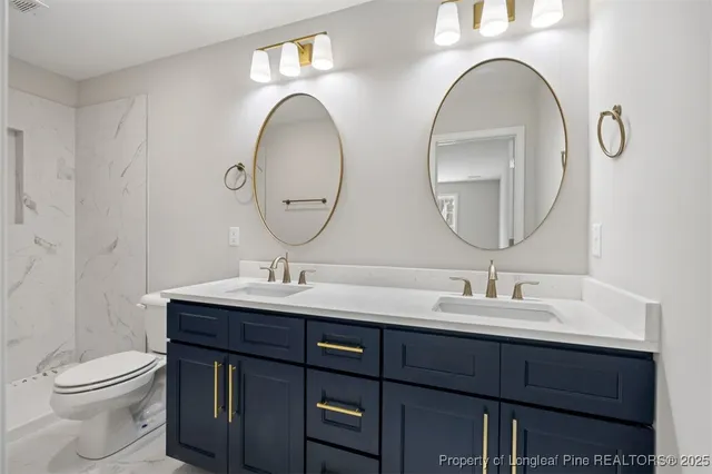 a bed room with a bed and a chandelier