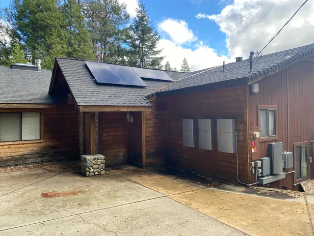 a bedroom with furniture and wooden floor