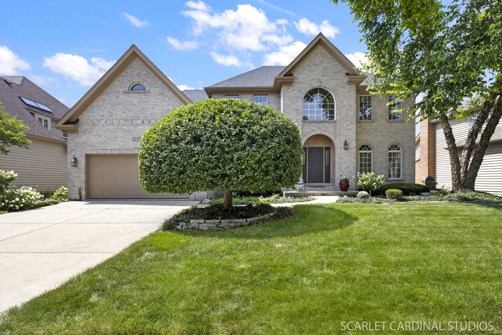 2124 Leverenz Road Naperville, IL 60564 - Photo 1 of 1 a front view of a house with a garden