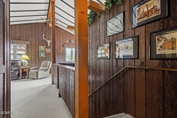 a view of a brick house with a outdoor space