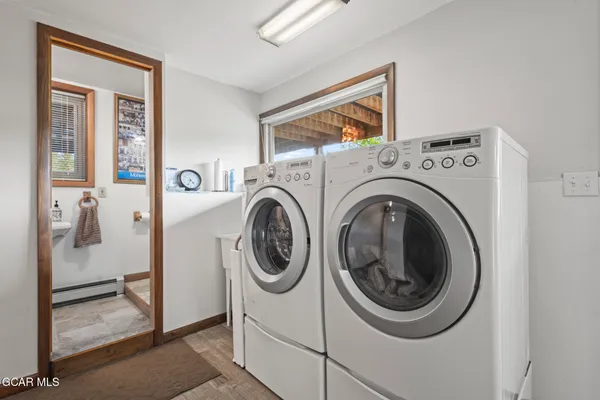 a utility room with dryer and washer