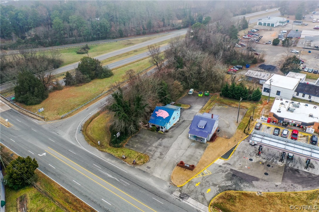 8011 Cold Harbor Road Mechanicsville, VA 23111 - Photo 11 of 20 a view of swimming pool with a dining table and chairs