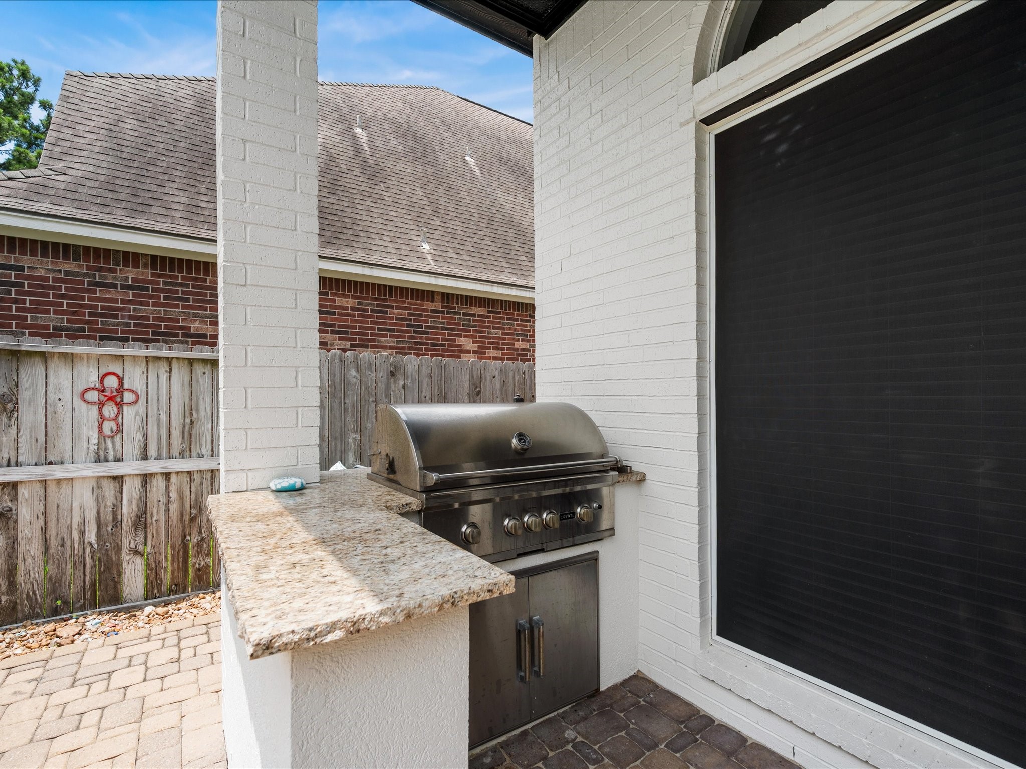 5910 Center Ct Drive Spring, TX 77379 - Photo 36 of 50 A built-in grill positioned just off the pool creates an effortless outdoor cooking space designed for entertaining and enjoying the backyard setting.
