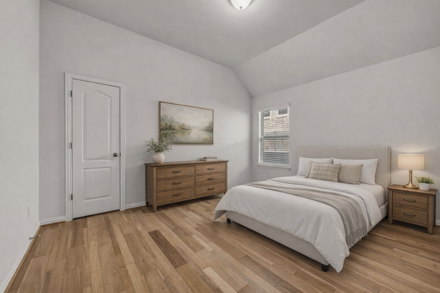 918 Leadtree Loop Buda, TX 78610 - Photo 10 of 27 Bedroom featuring light wood-type flooring and lofted ceiling