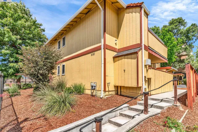 a view of a house with a patio