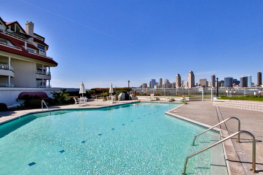 1099 1st Street, Unit 119 Coronado, CA 92118 - Photo 22 of 22 a view of a swimming pool and a back yard
