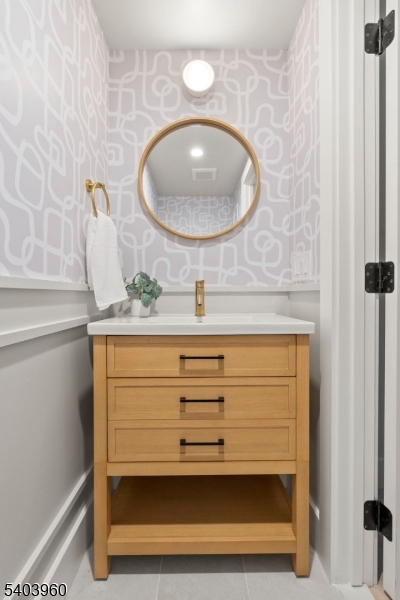112 Valley Road, Unit A Montclair, NJ 07042 - Photo 17 of 20 a bathroom with a sink and a mirror