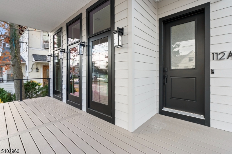 112 Valley Road, Unit A Montclair, NJ 07042 - Photo 19 of 20 a view of balcony with wooden floor and door