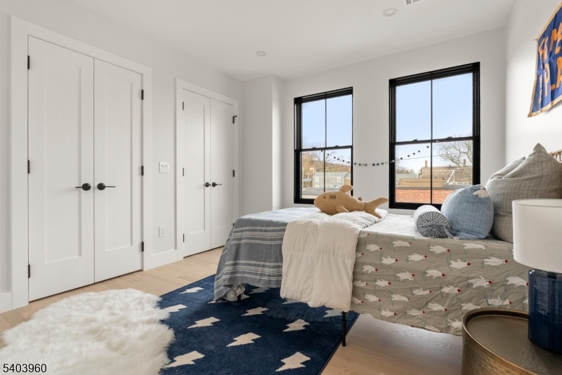 112 Valley Road, Unit A Montclair, NJ 07042 - Photo 8 of 20 a bedroom with a bed and a window