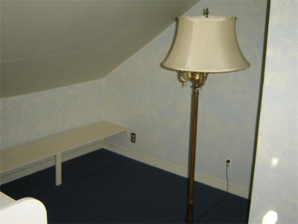 182 Riverton Road Springfield, MA 01109 - Photo 9 of 14 a room with a wooden floor and a table