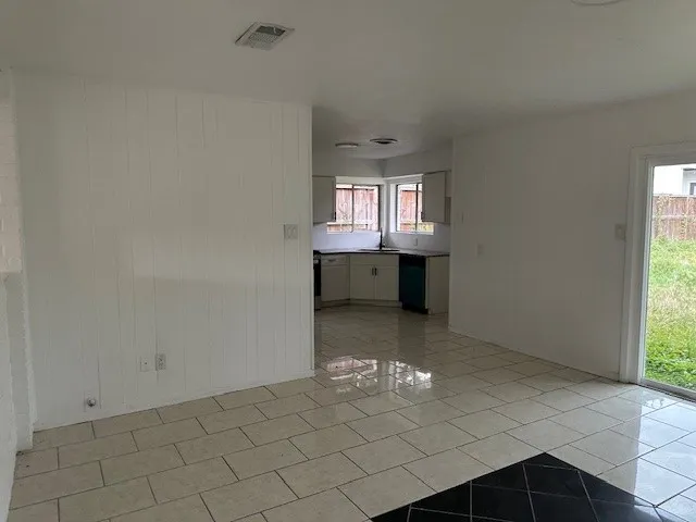 an empty room with windows