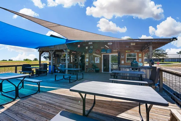 a kitchen with stainless steel appliances granite countertop a stove and a refrigerator