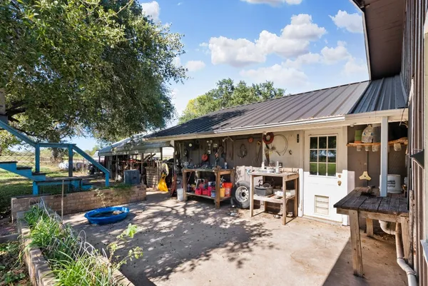 a view of a park with large trees