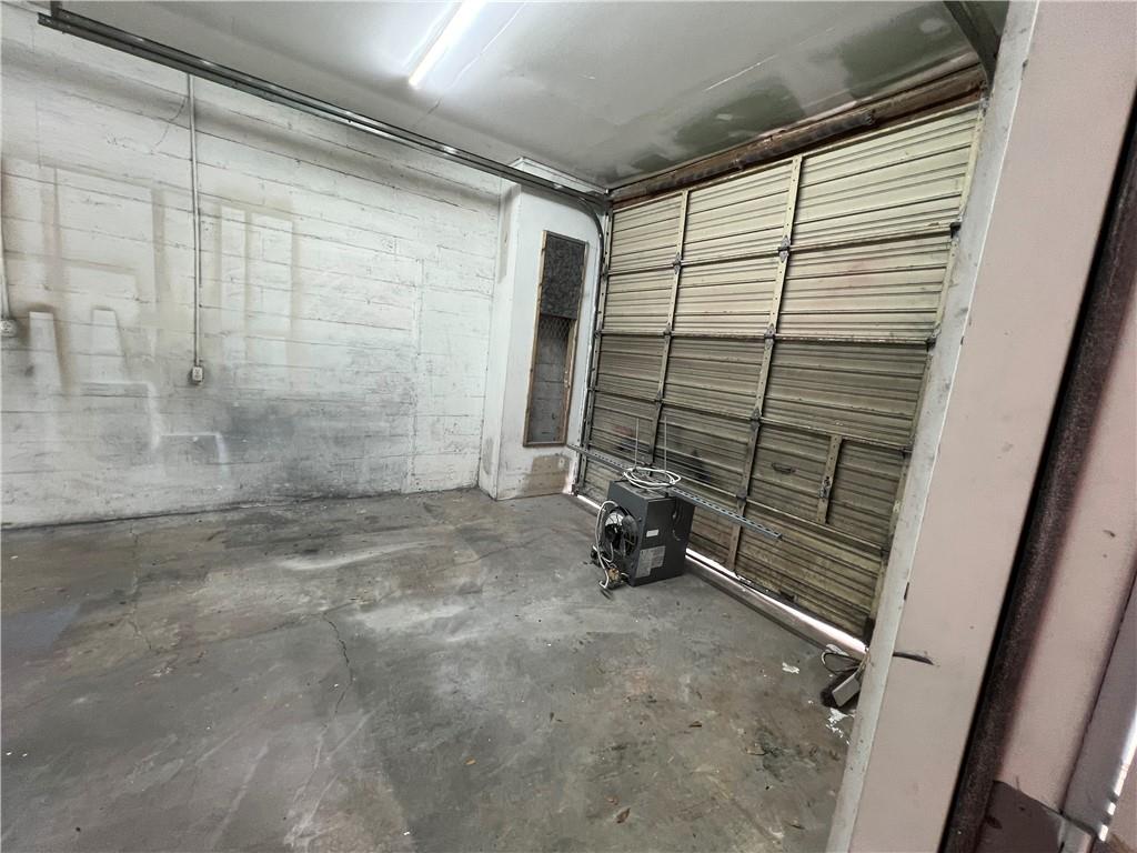 5536 Jackson Trail Road Hoschton, GA 30548 - Photo 36 of 41 a view of a room with rack on the wall