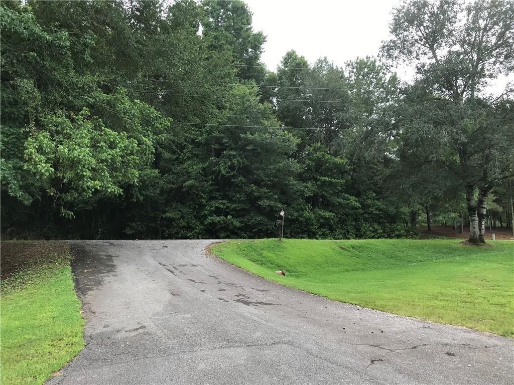 5536 Jackson Trail Road Hoschton, GA 30548 - Photo 9 of 41 a view of a park with large trees