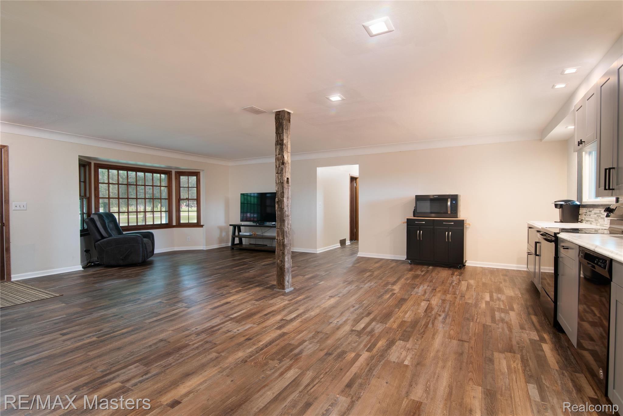 589 East Erie Road Temperance, MI 48182 - Photo 3 of 16 Imagine Sitting on a Nice Sectional, smelling Dinner Cooking!
