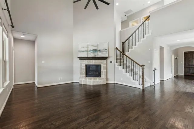 a view of an entryway with wooden floor