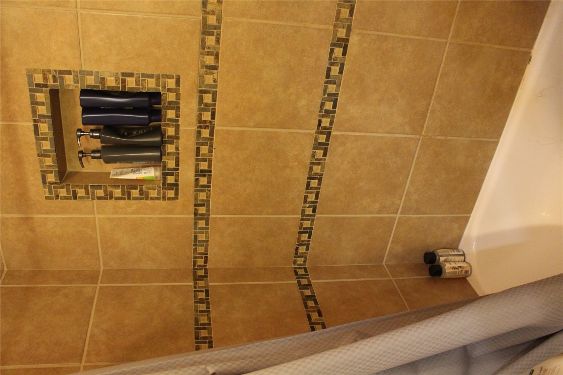2801 Rio Grande Street, Unit 202 Austin, TX 78705 - Photo 25 of 38 a bathroom with a shower