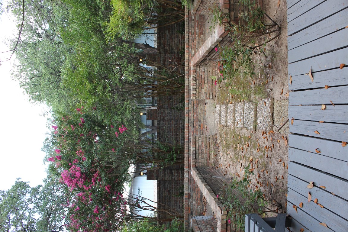 2801 Rio Grande Street, Unit 202 Austin, TX 78705 - Photo 36 of 38 a view of a swimming pool with a patio
