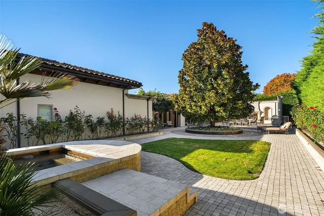 a view of a swimming pool with a patio