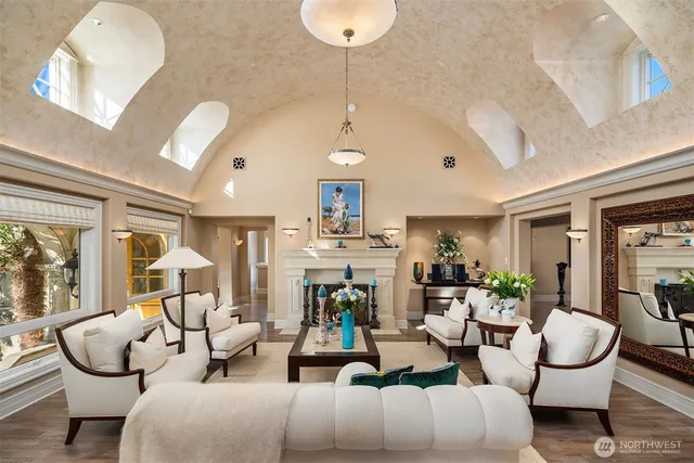 a large kitchen with granite countertop a sink and a stove