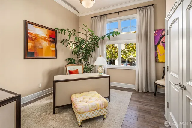 a view of a bathroom with dual sinks