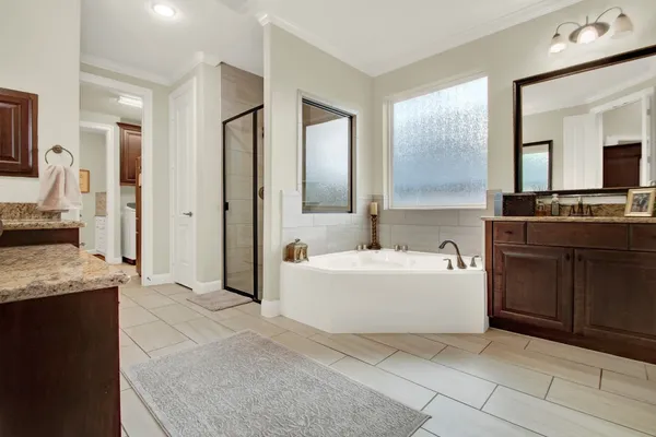 $675,000 | 210 Chirping Squirrel Court, Pinehurst, TX 77362