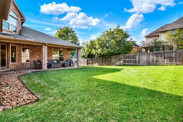 $675,000 | 210 Chirping Squirrel Court, Pinehurst, TX 77362