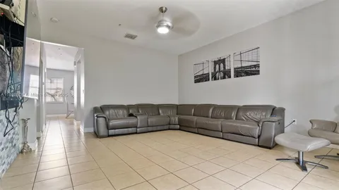a living room with furniture and a couch